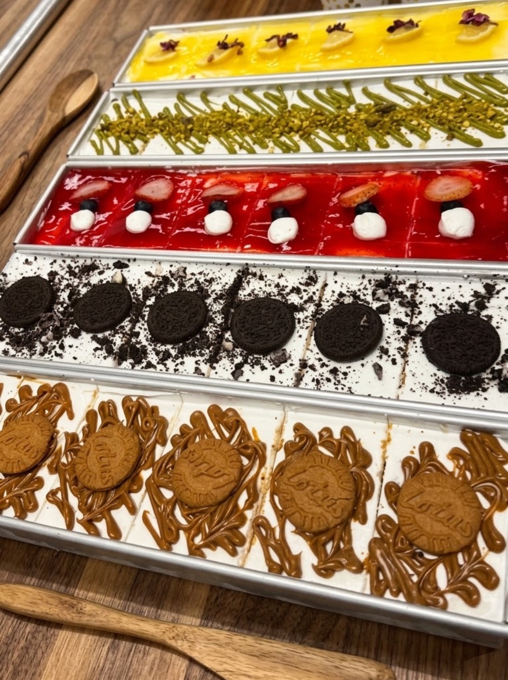 Oreo, Lemon, Pistachio, Biscoff, and Strawberry Cakes